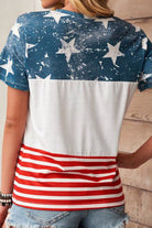 Stylish woman showcasing a patriotic graphic t-shirt with a striking slogan from GemThreads Boutique.