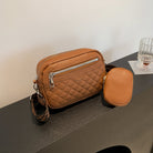 Elegant quilted PU leather crossbody bag with a patterned strap, a stylish accessory for any outfit.