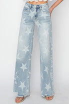Fashion-forward wide-leg jeans with star print and frayed hem, channeling a celestial vibe.