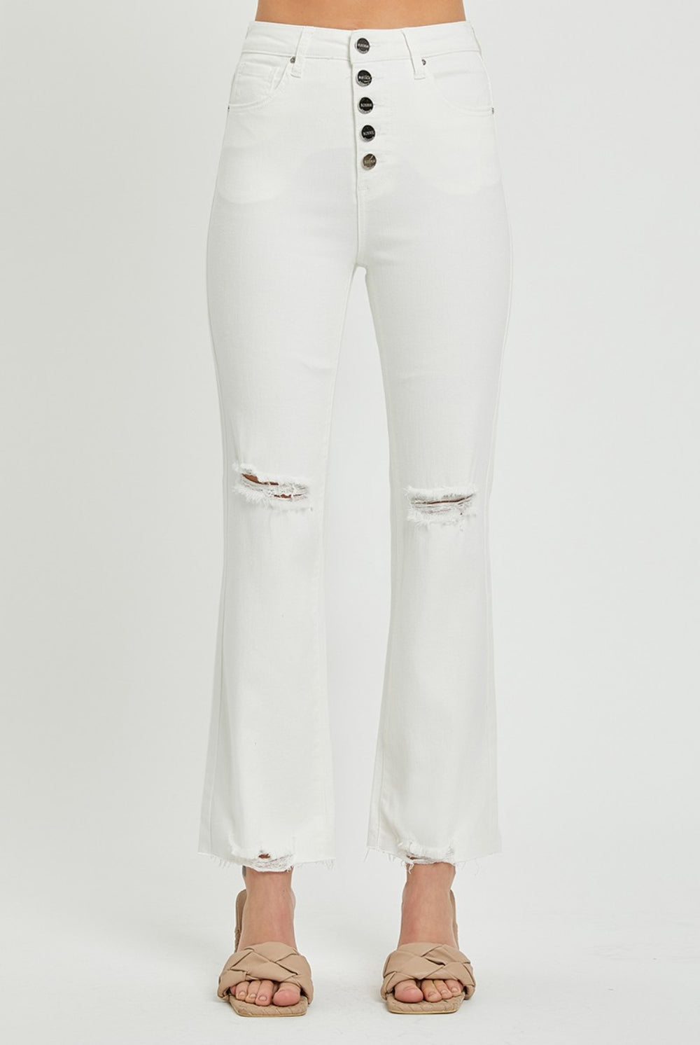 Model wearing GemThreads Boutique Distressed High-Rise Bootcut Jeans in white.