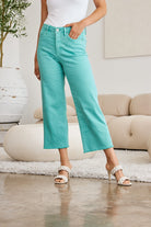 Woman wearing GemThreads Boutique high-waist raw hem tummy control jeans