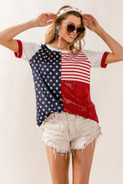  Woman sporting a patriotic stars and stripes tee shirt with sequin details