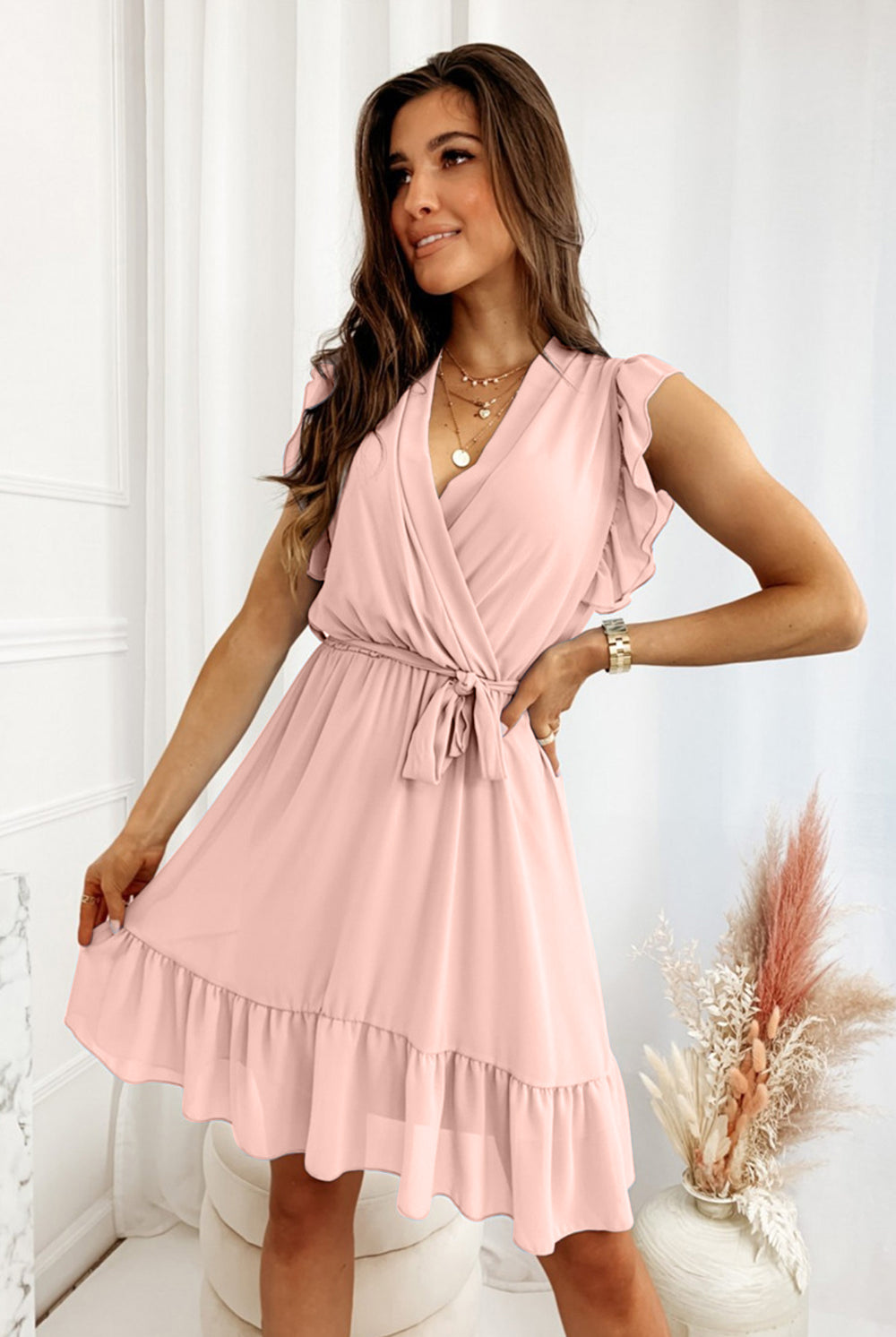 Graceful ruffle dress peach, with surplice neckline and cap sleeves, embodying sophistication and style, from GemThreads Boutique.