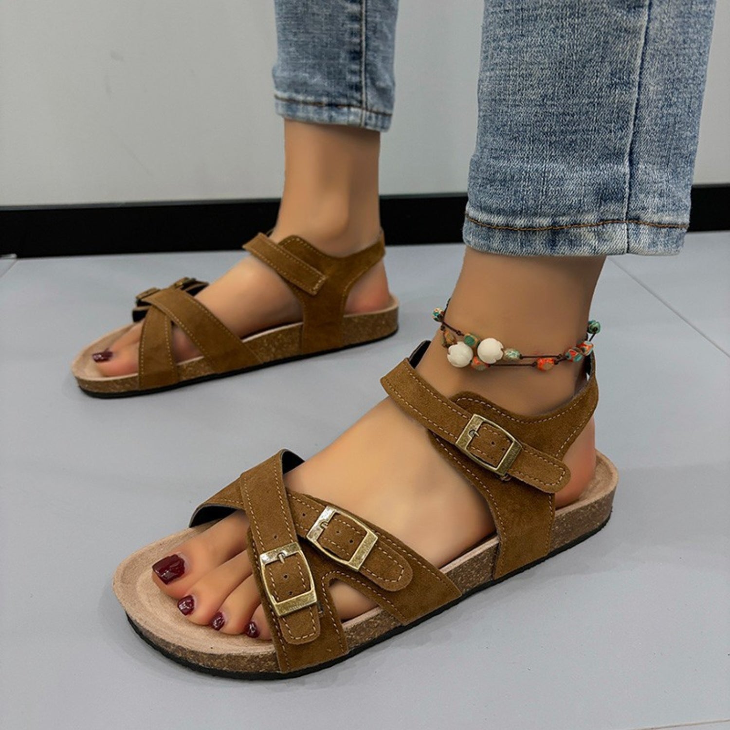 Stylish buckle sandals in a versatile hue, available at GemThreads Boutique.