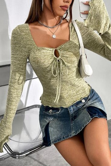 Heathered long sleeve t-shirt with a unique cutout neckline and drawstring, offering a snug and stylish look.