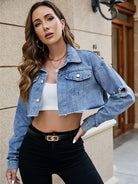 Distressed Raw Hem Cropped Denim Jacket - Edgy urban fashion statement featuring distressed details and a raw hem for a contemporary, chic look.
