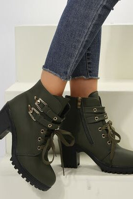 A pair of lace-up ankle boots with a block heel, metal eyelets, and a side zipper, showcasing a versatile style suitable for various outfits.