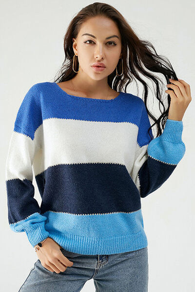 Woman's color block dropped shoulder sweater with a crew neck, available at Gem Threads Boutique.