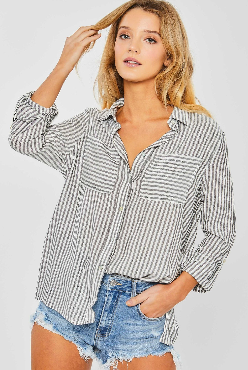 Elegant black and white striped long sleeve shirt with collar detail from GemThreads Boutique.