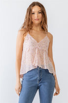 Elegant model wearing a light and airy lavender floral camisole top, ideal for a fresh spring look.