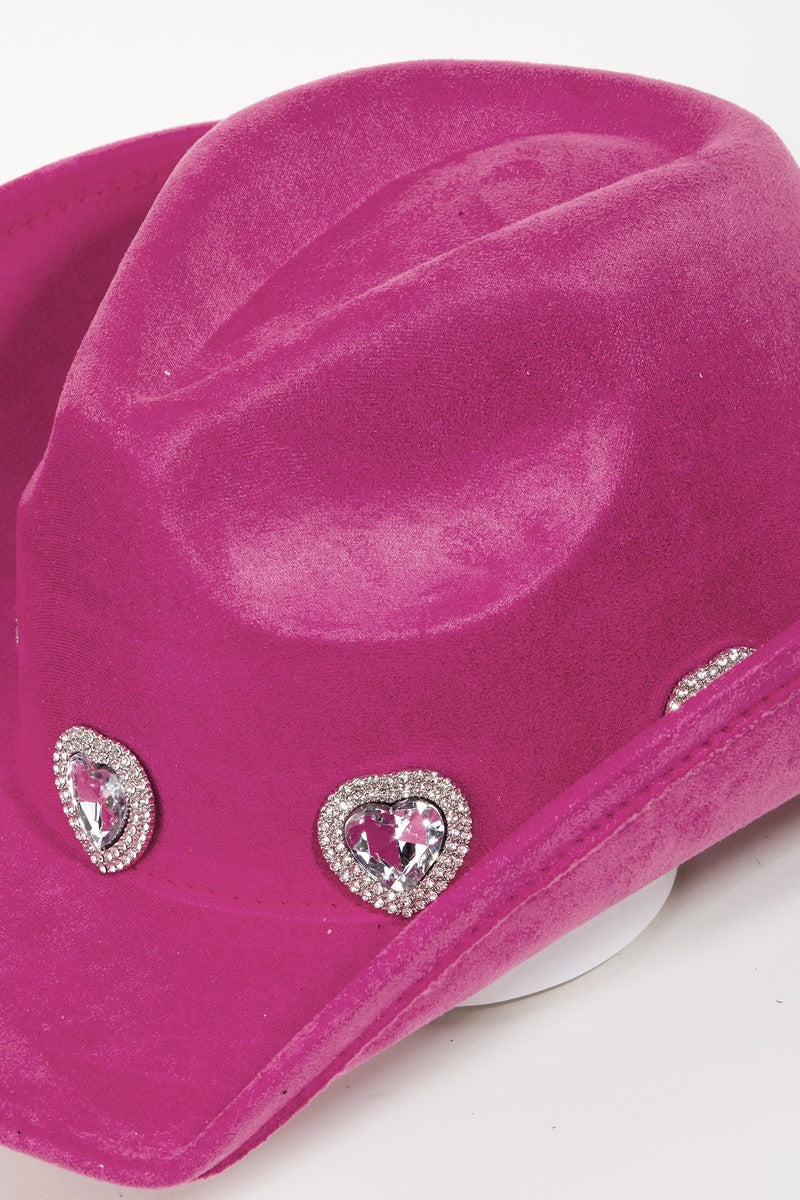 Rhinestone embellished cowboy hat in vibrant pink.