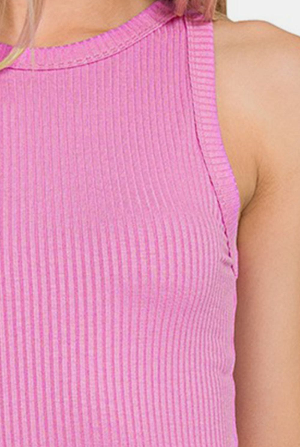 Model displaying a fitted mauve crew neck tank top