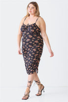 Chic plus size cami dress with a delicate floral pattern, perfect for any occasion.