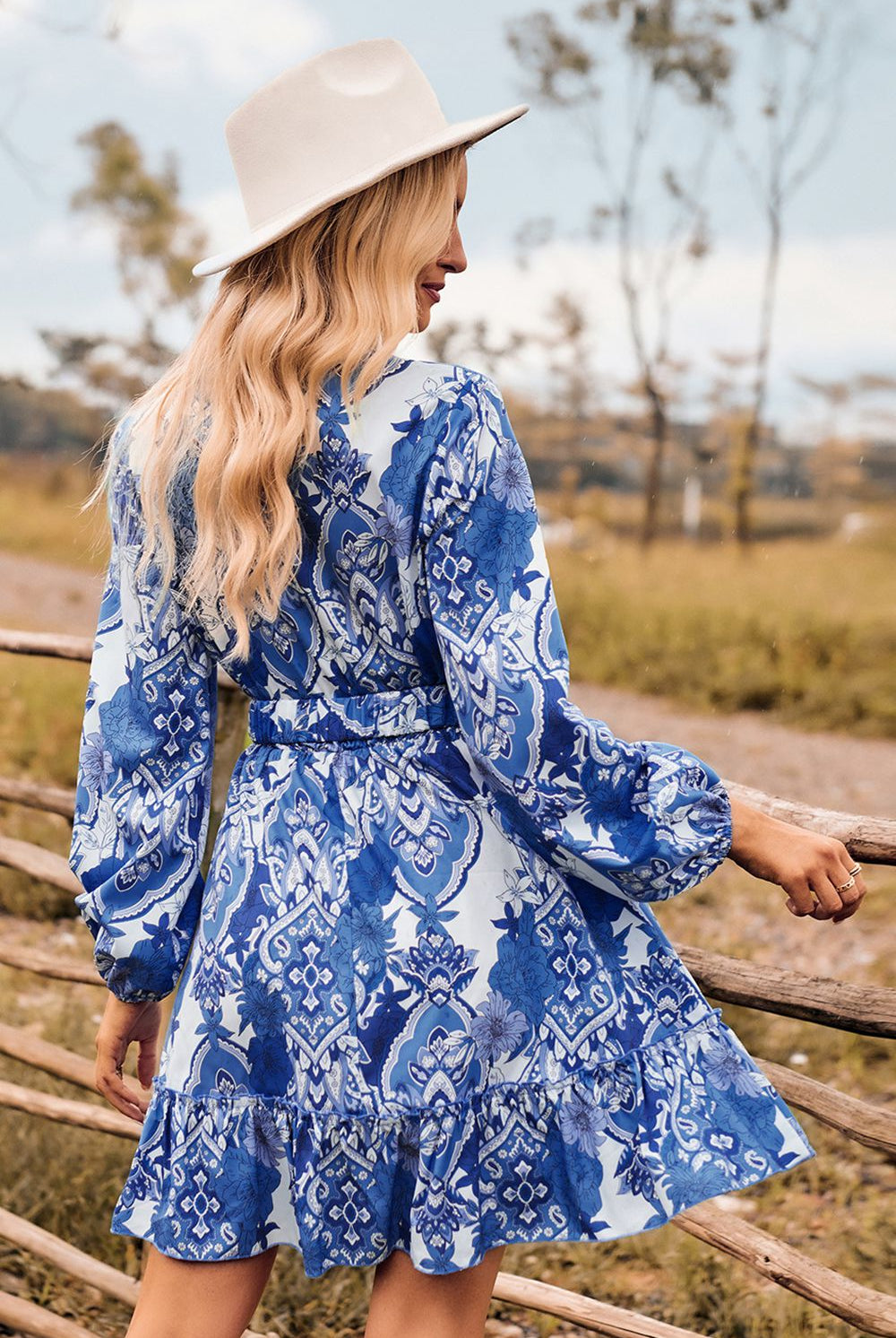 Printed Surplice Neck Long Sleeve Dress - GemThreads Boutique